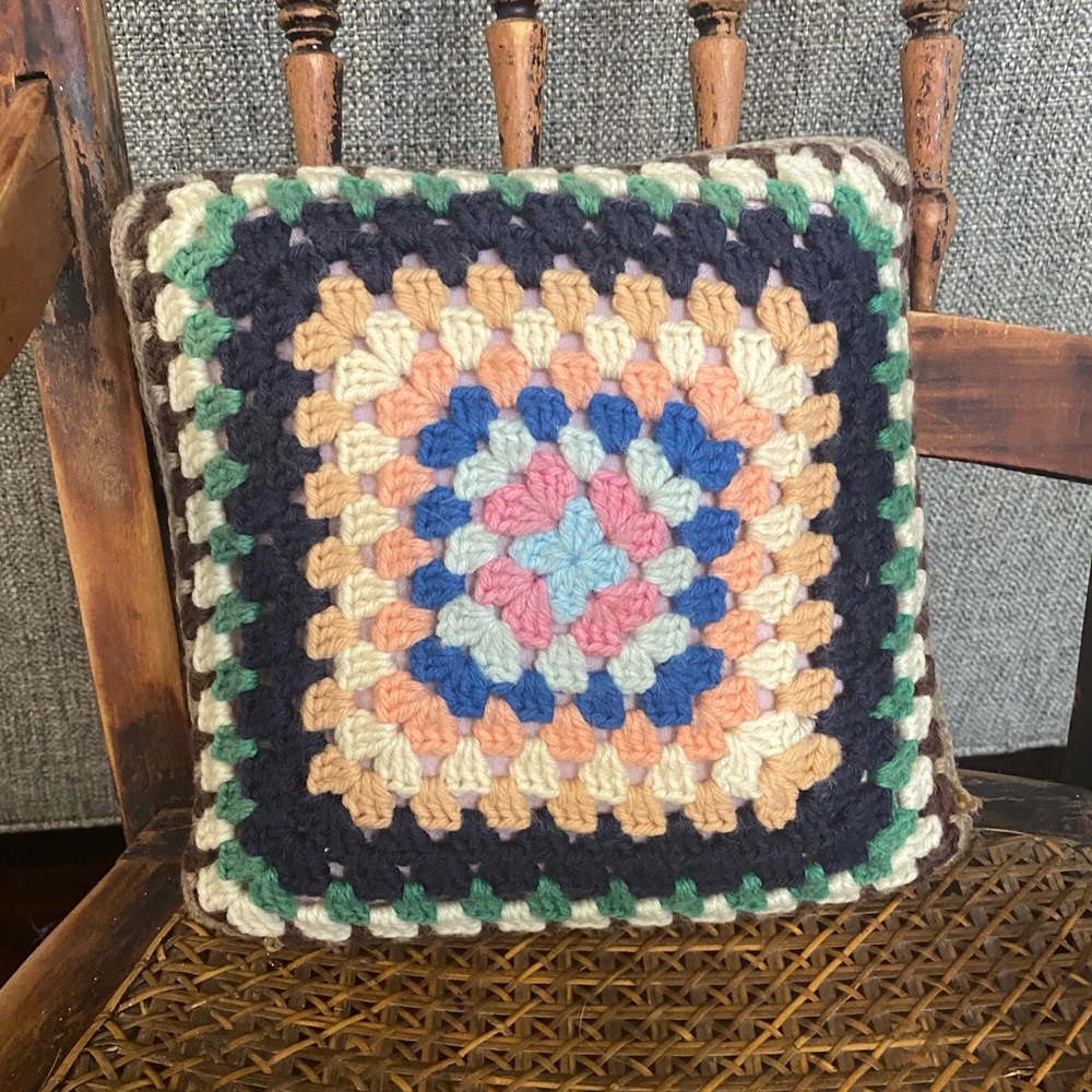 Granny square crocheted pillow